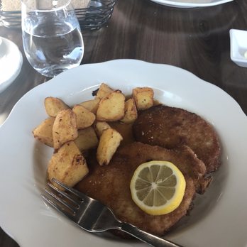 Oma’s Restaurant & Bakery - Schnitzel, potato's and gravy.  You can also see the Bratwurst, gravy and sauerkraut with potatoes. - Bakeries Near Me - Wadena, Minnesota