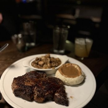 Stubrik's Steakhouse - 16oz Ribeye with mashed potatoes and gravy and suateed mushrooms - Steakhouses Near Me - Fullerton, California Stubrik's Steakhouse - 16oz Ribeye with mashed potatoes and gravy and suateed mushrooms - Steakhouses Near Me - Fullerton, California