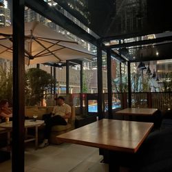Outside rooftop Patio with pool in background