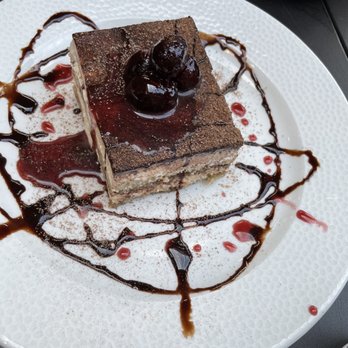 La Toscana - Tiramisu. I liked the tiramisu itself, but not so hot on the cherry sauce and fake cherry on it. - Italian Near Me - San Rafael, California La Toscana - Tiramisu. I liked the tiramisu itself, but not so hot on the cherry sauce and fake cherry on it. - Italian Near Me - San Rafael, California