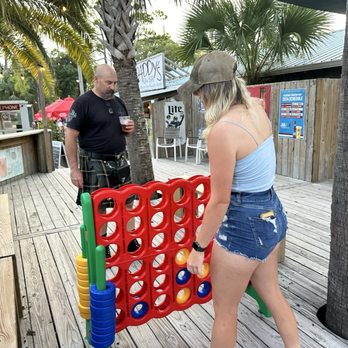Paddy's Raw Bar - Fun connect four and cold beer while waiting to feast on oysters - Seafood Near Me - Saint George Island, Florida Paddy's Raw Bar - Fun connect four and cold beer while waiting to feast on oysters - Seafood Near Me - Saint George Island, Florida