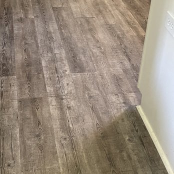 Integrity Flooring - a wood look tile floor in a kitchen - Flooring Near Me - Harrisburg, North Carolina Integrity Flooring - a wood look tile floor in a kitchen - Flooring Near Me - Harrisburg, North Carolina