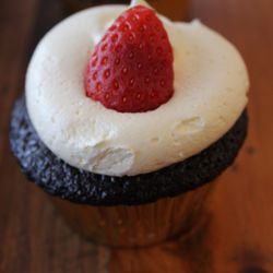 Maggie's Munchies - Old Fashioned moist Chocolate cupcake stuffed with Nutella & topped with smooth & creamy vanilla buttercream, garnished with a fresh berry