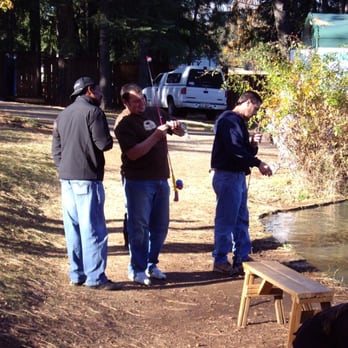 High Hill Ranch - Bee D.'s Hubby talking to a man who caught a fish - Donuts Near Me - Placerville, California