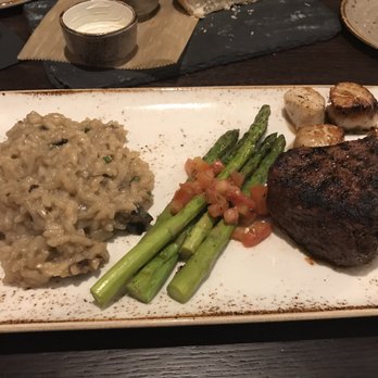 J Gilbert's - 6oz Filet combo with seared scallops. Sides were asparagus and wild mushroom risotto. - Bars Near Me - Omaha, Nebraska