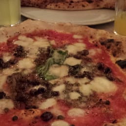 San Gennaro with anchovis and Calzone San Salvatore at the back San Gennaro with anchovis and Calzone San Salvatore at the back