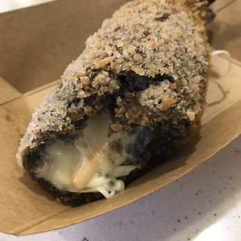 Mr.Cow-Ala Moana - The inside of squid ink hot dog - Hot Dogs Near Me - Honolulu, Hawaii