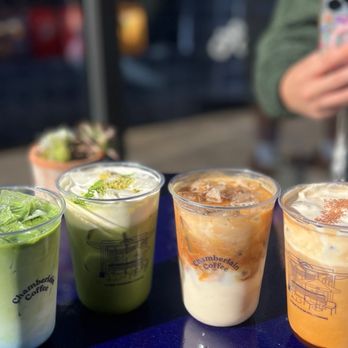 Chamberlain Coffee - Blue Matcha (left), Salted Pistachio Matcha (2), Emma's Way (3), Peanut Butter Mocha (right) - Coffee & Tea Near Me - Los Angeles, California Chamberlain Coffee - Blue Matcha (left), Salted Pistachio Matcha (2), Emma's Way (3), Peanut Butter Mocha (right) - Coffee & Tea Near Me - Los Angeles, California