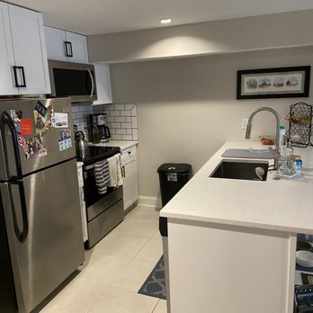 Sundance Contracting - a kitchen with stainless steel appliances - General Contractors Near Me - Washington, DC, District of Columbia