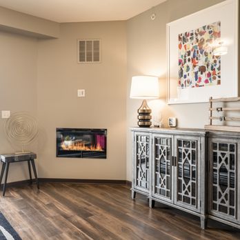360 at Jordan West - Our 1-bed Willow floor plan with private balcony, electric fireplace, modern kitchen with stainless steel appliances, and walk-in closet. - Apartments Near Me - West Des Moines, Iowa 360 at Jordan West - Our 1-bed Willow floor plan with private balcony, electric fireplace, modern kitchen with stainless steel appliances, and walk-in closet. - Apartments Near Me - West Des Moines, Iowa