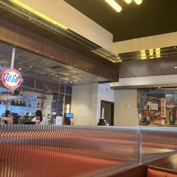 Silver Diner - Restaurant interior. Wall mural of tractor and To go sign. - New American Near Me - Arlington, Virginia Silver Diner - Restaurant interior. Wall mural of tractor and To go sign. - New American Near Me - Arlington, Virginia