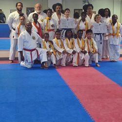 Brian Hobson Karate - Chance received his orange and gold belt attitude and behavior have changed he is more polite