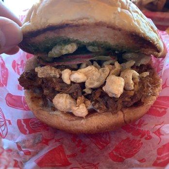 Lil Woody's - A special sammie, The Sarap Sandwich which had pulled pork adobo, patis salsa verde, chicharrones, radish and on a Hawaiian bun! - Burgers Near Me - Seattle, Washington Lil Woody's - A special sammie, The Sarap Sandwich which had pulled pork adobo, patis salsa verde, chicharrones, radish and on a Hawaiian bun! - Burgers Near Me - Seattle, Washington