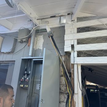 RG's and Son's Electric Force - New panel being installed. - Electricians Near Me