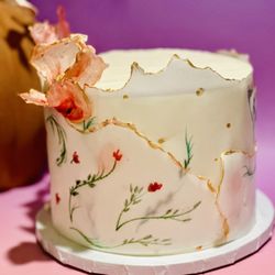 Miss Buttermins Bakeshop - Wafer painted cakes are unique and oh so tasty! Who doesn't love art and cake?