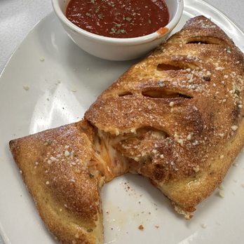 TJ's Pizza & Wings - Calzone - American Near Me - Scottsdale, Arizona TJ's Pizza & Wings - Calzone - American Near Me - Scottsdale, Arizona
