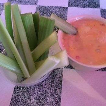 Coyote Bluff Cafe - Queso and they brought us celery since we don't eat chips. - Burgers Near Me - Amarillo, Texas