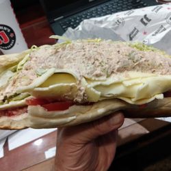 Tuna sub with provolone cheese or get it without. Massive and yummy.