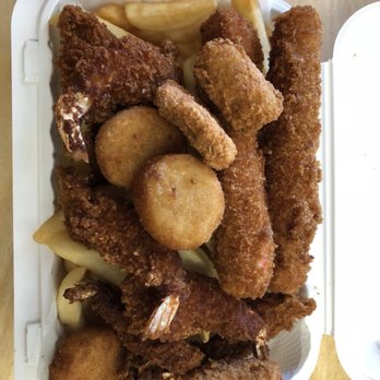 Seafood House - Fried seafood deluxe (shrimp, scallops, crab stick, shark nuggets and fries) - Seafood Near Me - Mount Eden, New York Seafood House - Fried seafood deluxe (shrimp, scallops, crab stick, shark nuggets and fries) - Seafood Near Me - Mount Eden, New York