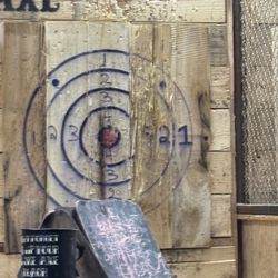 Rage’N Ace - Show the big gap in the board where axe didn't stick.