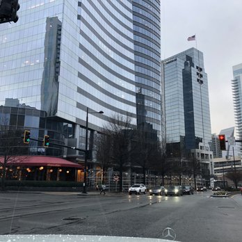 Bistro Niko - The red awning welcomes patrons in the glassy heart of Buckhead. - French Near Me - Atlanta, Georgia
