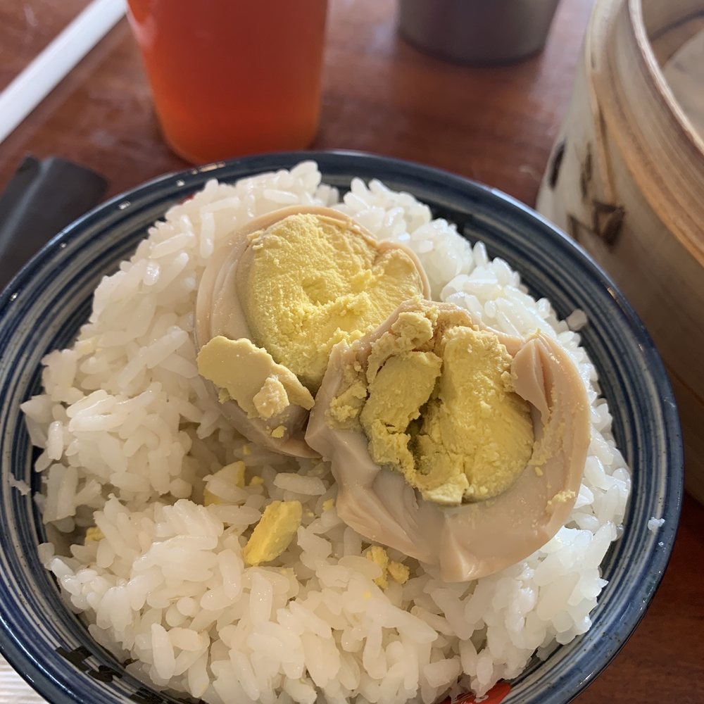 Noodle St - Braised Egg (overcooked) on top of side of rice - Noodles Near Me - Fullerton, California Noodle St - Braised Egg (overcooked) on top of side of rice - Noodles Near Me - Fullerton, California