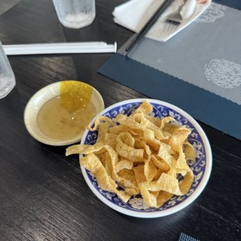 Home Noodles Asian Cuisine - Complimentary wonton chips - Chinese Near Me - Spring, Texas Home Noodles Asian Cuisine - Complimentary wonton chips - Chinese Near Me - Spring, Texas