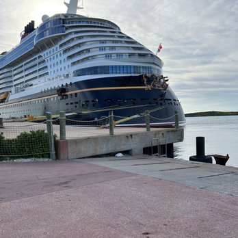 Travel Lark Travels - The Disney Wish cruise ship docked at Castaway Cay - Travel Agents Near Me - Fairfield, California Travel Lark Travels - The Disney Wish cruise ship docked at Castaway Cay - Travel Agents Near Me - Fairfield, California