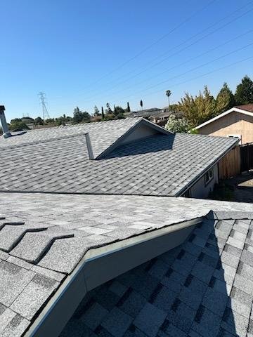 Slide of Zaguilan Roofing Service