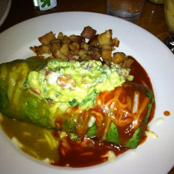 Flo - Smothered Burrito, Christmas version (half red, half green chile) - Breakfast & Brunch Near Me - Chicago, Illinois Flo - Smothered Burrito, Christmas version (half red, half green chile) - Breakfast & Brunch Near Me - Chicago, Illinois