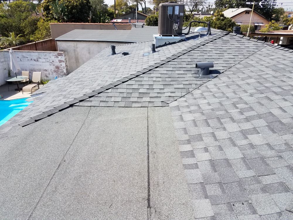 Slide of Estradas Roofing Solutions