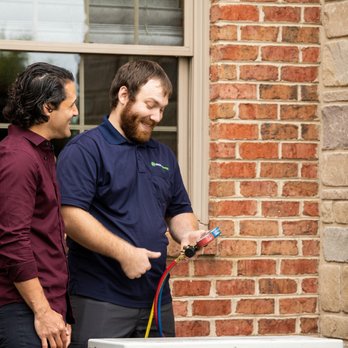 Shipley Energy - Shipley Energy's HVAC Technician, Derek, explaining the AC Tune Up process to a homeowner - Heating & Air Conditioning/HVAC Near Me - York, Pennsylvania Shipley Energy - Shipley Energy's HVAC Technician, Derek, explaining the AC Tune Up process to a homeowner - Heating & Air Conditioning/HVAC Near Me - York, Pennsylvania