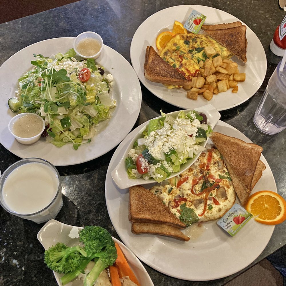 Symposium Cafe Restaurant - Build-Your-Own Omelettes (with veggies), toasts, potatoes, Mediterranean Salad, side Steamed Vegetables - Breakfast & Brunch Near Me - Waterdown, Ontario Symposium Cafe Restaurant - Build-Your-Own Omelettes (with veggies), toasts, potatoes, Mediterranean Salad, side Steamed Vegetables - Breakfast & Brunch Near Me - Waterdown, Ontario