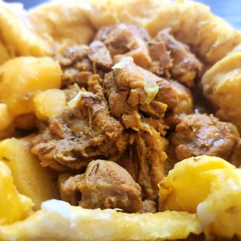 Yabba's/Oga's Kitchen - Chicken Curry roti - New American Near Me - Plainfield, New Jersey Yabba's/Oga's Kitchen - Chicken Curry roti - New American Near Me - Plainfield, New Jersey