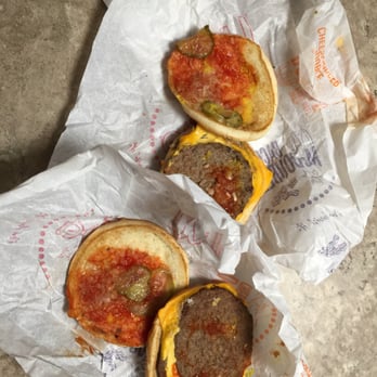 McDonald's - three burgers on a piece of paper - Fast Food Near Me - Saline, Michigan McDonald's - three burgers on a piece of paper - Fast Food Near Me - Saline, Michigan