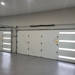 Five Star Doors - Installation of a16x7 and an 8x7 Amarr Lincoln 3000 with slim windows in black