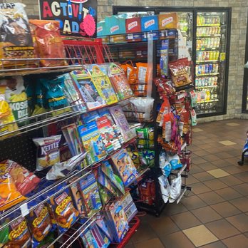 McDonald's - a woman pushing a stroller in a grocery store - Burgers Near Me - Fairfield, Virginia
