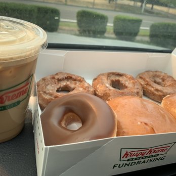 Krispy Kreme - Pumpkin spice iced latte and 3 pumpkin cake donuts 2 lemon filled and a chocolate glazed to fulfill my sweet tooth and pumpkin cravings! - Donuts Near Me - Beaverton, Oregon