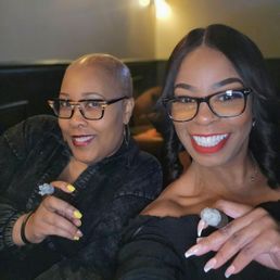 Best friends and first timers enjoying The Embassy Cigar Lounge.