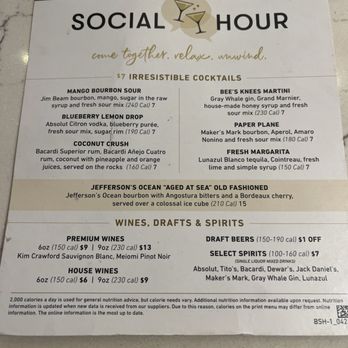 Bonefish Grill - Social hour drink side - A printed menu promoting social hour from 3:00 PM to 6:30 PM, with a selection of cocktails, wines, and spirits. The menu lists specific drinks such as Mango Bourbon Sour, Blueberry Lemon Drop, and Bee's Knees Martini, along with their ingredients and calorie counts. It also features wine options, including Kim Crawford Sauvignon Blanc and Meiomi Pinot Noir, and spirits like Absolut Tito's and Gray Whale Gin. The menu emphasizes discounted draft beers and a specific cocktail served over a coleslaw ice cube. - Seafood Near Me - Gambrills, Maryland
