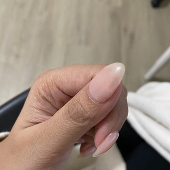 Adorn Nails and Spa - A small hole and white stuff under - Nail Salons Near Me - Cedar Park, Texas