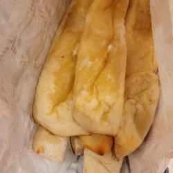 Little Caesars - Raw breadsticks that looked eaten out of