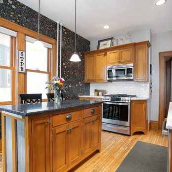 Castle Building & Remodeling: NE Mpls - a kitchen with wood cabinets - General Contractors Near Me - Minneapolis, Minnesota Castle Building & Remodeling: NE Mpls - a kitchen with wood cabinets - General Contractors Near Me - Minneapolis, Minnesota