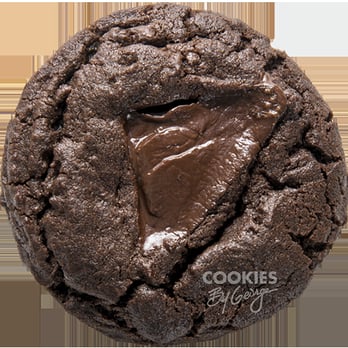 Cookies By George - a chocolate cookie with a bite taken out of it - Bakeries Near Me - Edmonton, Alberta Cookies By George - a chocolate cookie with a bite taken out of it - Bakeries Near Me - Edmonton, Alberta