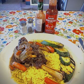 Calypso Cafe - Lamb shank, rice, and grilled vegetables - Breakfast & Brunch Near Me - Coronado, California Calypso Cafe - Lamb shank, rice, and grilled vegetables - Breakfast & Brunch Near Me - Coronado, California