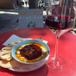 Habibi Bar - Outdoor table with wine and appetizer