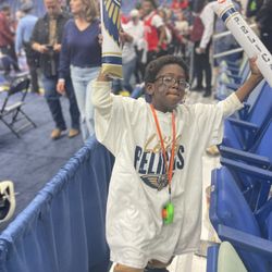 New Orleans Pelicans - Small fan in Smoothie King Center at Pelicans home Game