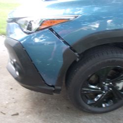 Reber Auto & Body Repair - crunched drivers side  front bumper on 2023 Subaru Crosstrek,