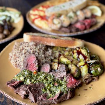 Urban Plates - Chimichurri Steak with Red & White Quinoa with Tomato Pesto and Roasted Brussels Sprouts with Balsamic Glaze - New American Near Me - Brea, California Urban Plates - Chimichurri Steak with Red & White Quinoa with Tomato Pesto and Roasted Brussels Sprouts with Balsamic Glaze - New American Near Me - Brea, California
