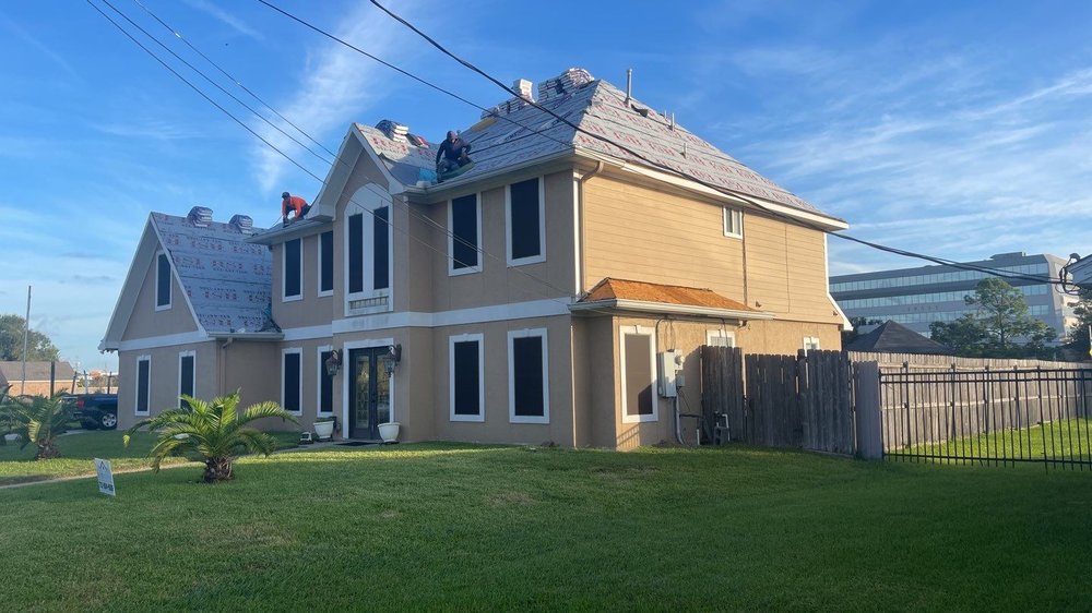 Slide of Elite Roofing